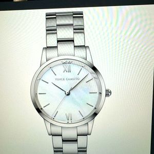 Luxurious stainless steel watch, mother of pearl dial and Roman markers.